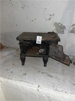 Cast-iron miniature stove