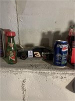 No. 3 car, 7up bottle, Pepsi Super Bowl can