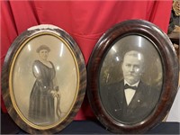 Two antique oval frames pictures