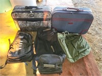 Estate lot of suitcases and bags