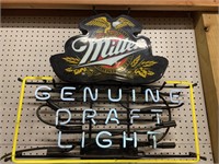 Miller draft neon sign lights up