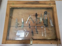 Vintage oak wood showcase with knives