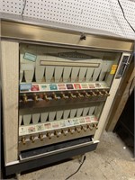 Vintage cigarette machine with the key does not