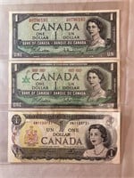 3 Canadian $1 bills.