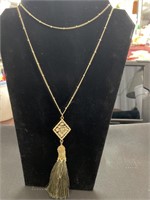 Gold tone tassel necklace