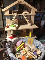 DOLL HOUSE W/ ASSORTMENT  OF WOOD FUNITURE