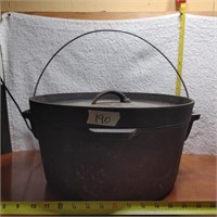 VERY LARGE CAST IRON DUTCH OVEN W/ LID