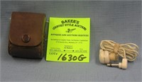 Pair of vintage ear plugs in original leather case