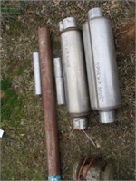 69) 2 mufflers and pipe - NEW
