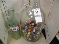JUG OF MARBLES AND COCA COLA BOTTLE