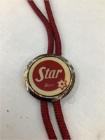 Early Dubuque Star Beer Bolo Tie, Plastic