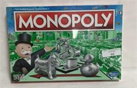 Monopoly game (new still has plastic on box)