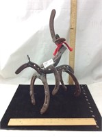 Welded Cowboy On Horse Horseshoe Statue