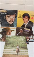 Assorted Vinyl Records ... 
Eddie Rabbitt, Elvis,