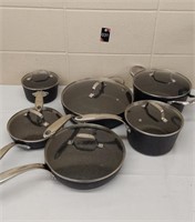 The Rock.  6 Pan and lid set
