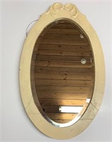Vieux miroir ovale biseauté