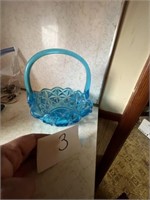 Blue handled basket