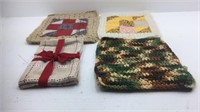 Three Crocheted Potholders and Two Hand Towels