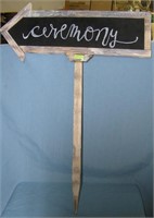 Ceremony stick in the ground arrow sign