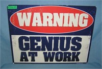 Warning: Genius at Work retro style advertising si