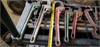 Five pipe wrenches
