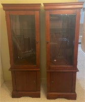 Two piece cabinet with glass shelves