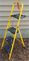 Yellow Step Ladder. Right Side Of Garage, Outside