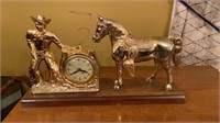 Vintage TV clock , cowboy with horse , gold metal
