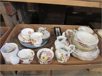 Assorted plates, cups, small pitchers