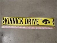 Metal Kinnick Drive street sign