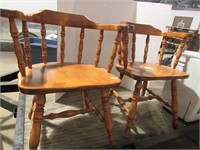 Two wooden dining chairs