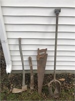 FOUR TOOLS TRENCH PICK MACHETE HAND SAW AND POST