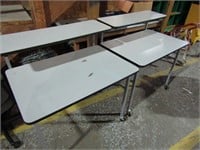 2 Particle Board Tables on Wheels