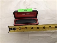 Hohner harmonica in case