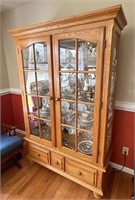 48 x 72 lighted curio cabinet continents not
