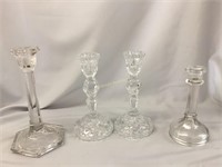 Waterford type candle holder set and two singles