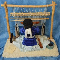 Navajo woman and loom