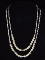 Set of two silver and pearl necklaces