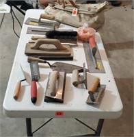 Bag of concrete hand tools, floats