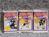 3 unopened packs of 1991 score NHL hockey cards