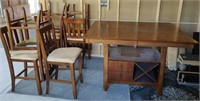 NICE WOODEN TABLE w/ 8 CHAIRS & STORAGE