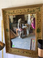 Gold framed mirror with painted decoration