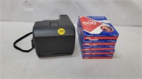 POLAROID CAMERA WITH 5 NEW BOXES OF FILM
