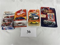 Lot of 4 Assorted Cars In Original Packaging