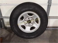 Spare Tire on 6 - lug Rim, size 235 / 75 R16
