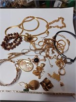 Lot of Goldtone Jewelry to Include Bracelets,