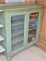 Rolling Cabinet with Hull Pottery