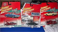 Three vintage Johnny lightning cars