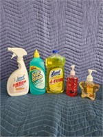 Assorted cleaning supplies and hand sanitizer