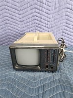 TMK portable black and white tv-radio, powers on,